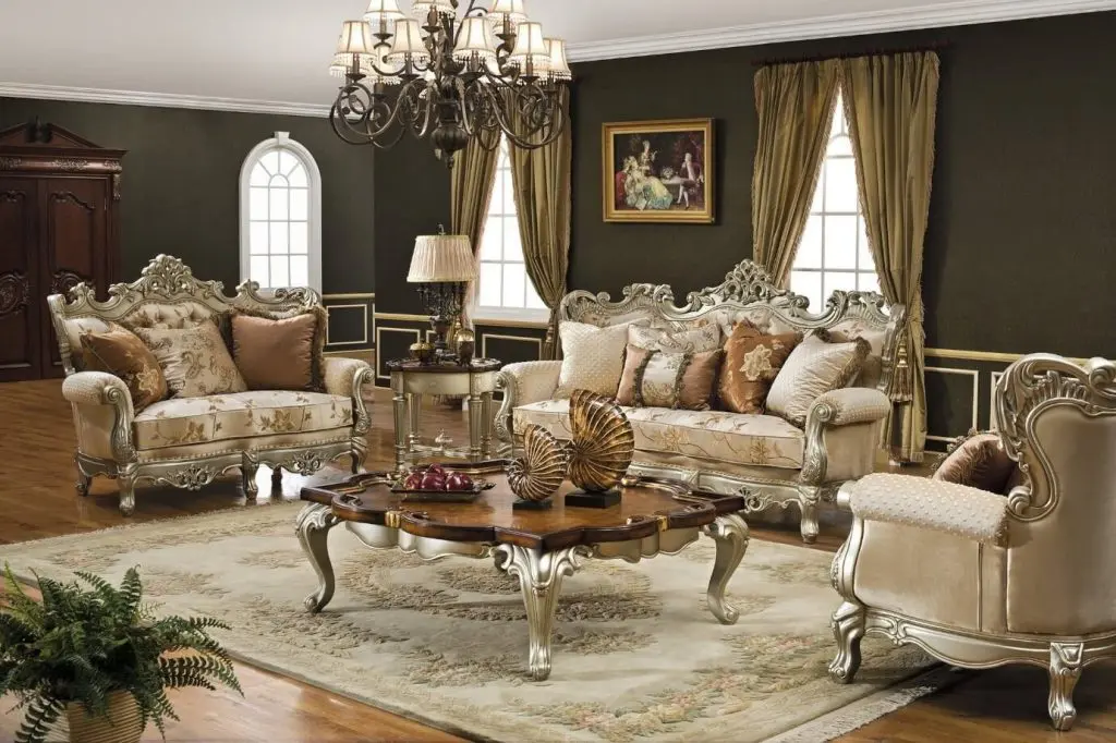 Sofas with heavy metal work giving a vintage look for living room