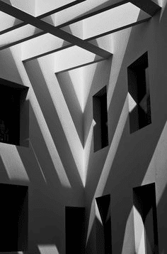 Shadows created on walls due to patterned ceiling design