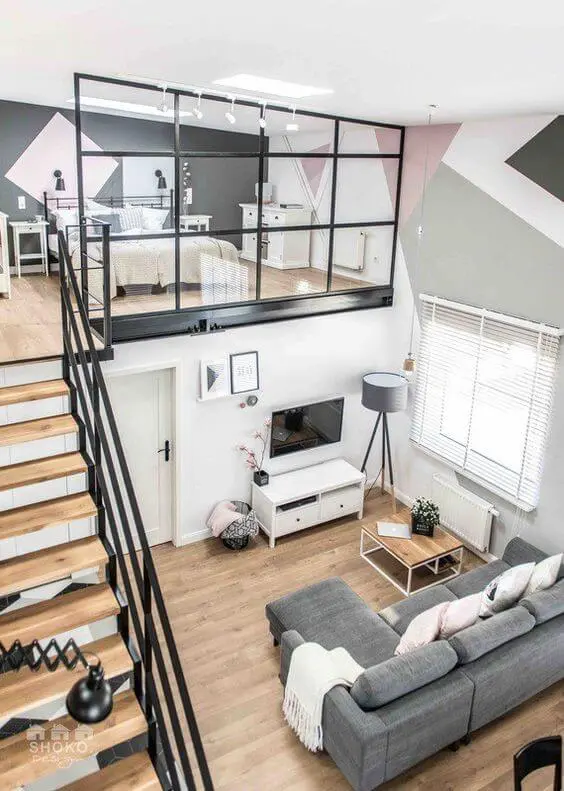 Mezzanine bedroom with a cozy bed