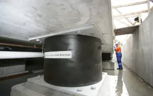 Building seismic base isolator