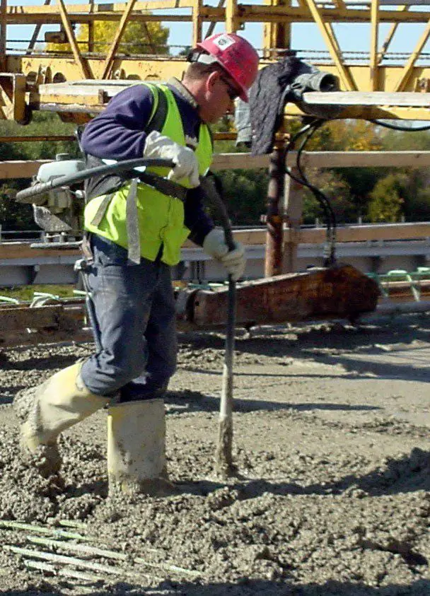 Ensure proper compaction of concrete using needle vibrator