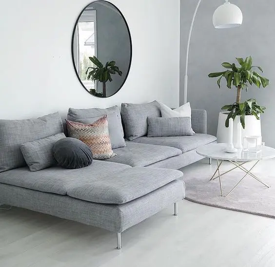 neutral toned rugs and furnishing such as cushions and curtains