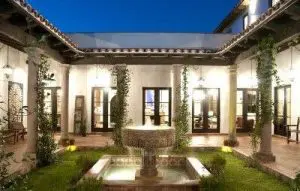 Courtyard with creepers and fountain as focal point
