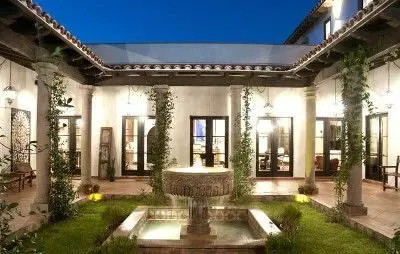 Courtyard with creepers and fountain as focal point
