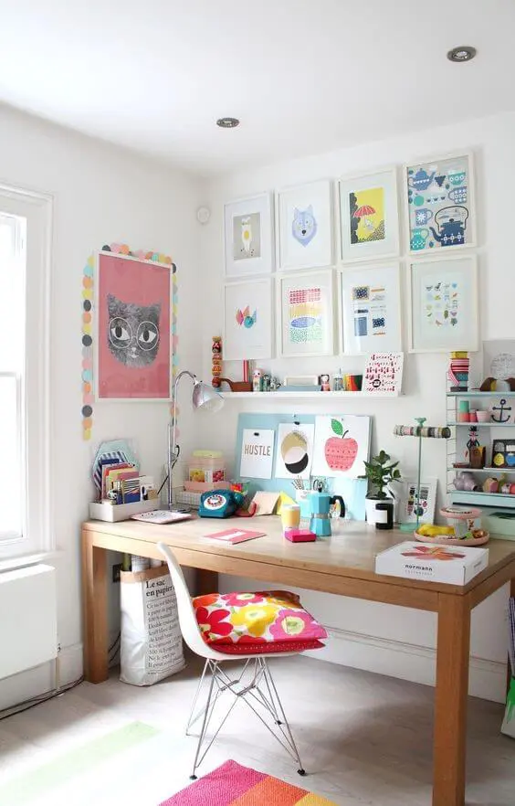 Study table with colouful posters placed on the wall