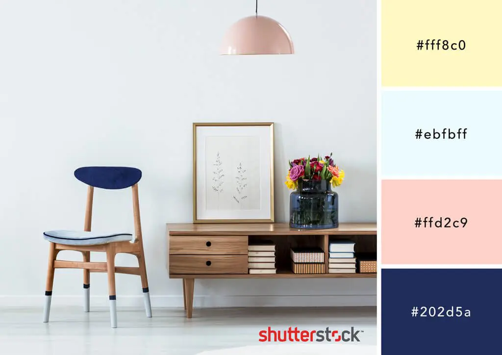 A mixture of warm wood and pastel color furniture