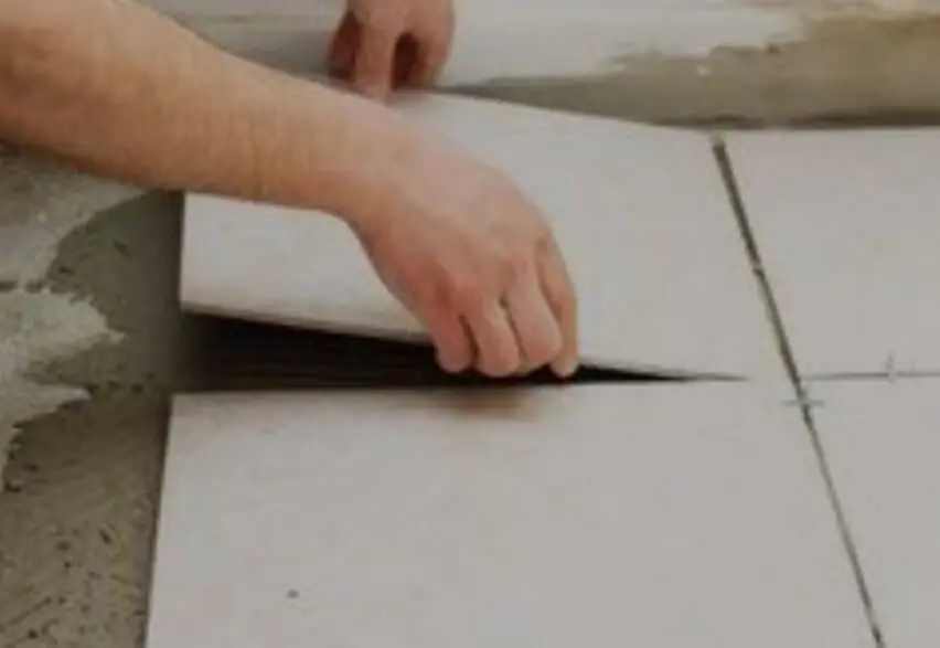 Laying of Vitrified tiles on motar laid