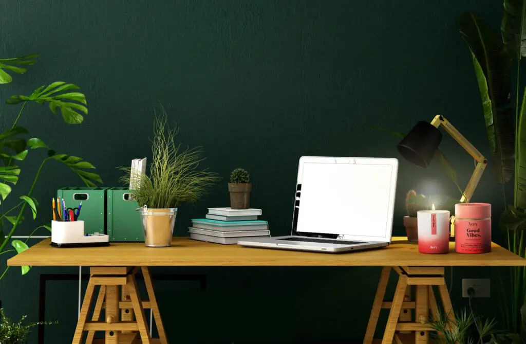 Candle light on a work desk at home