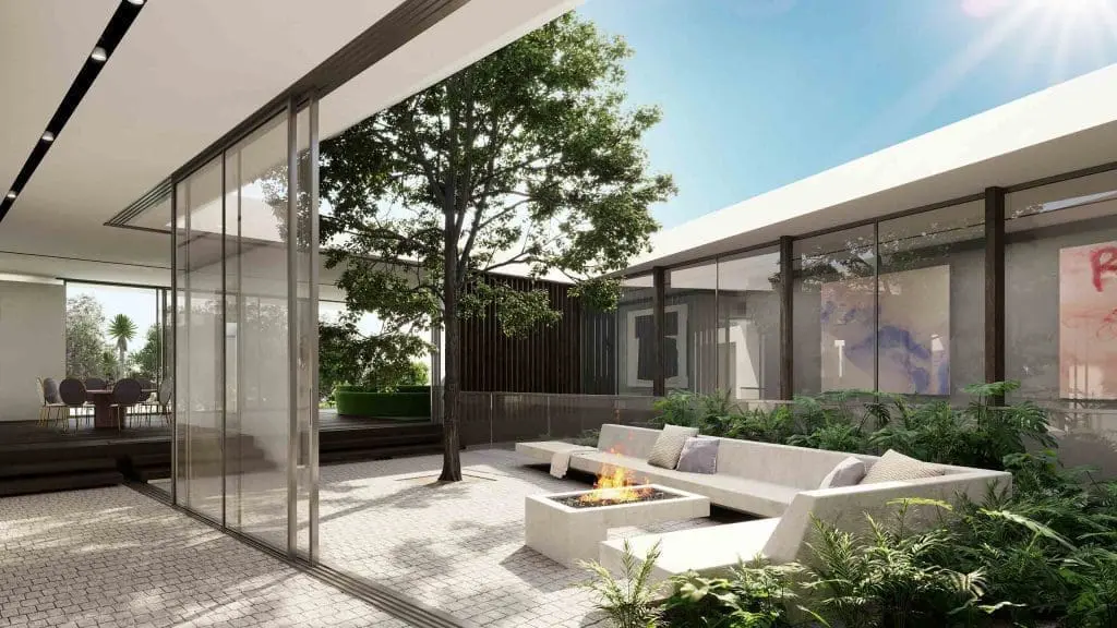 A courtyard with a seating space and garden