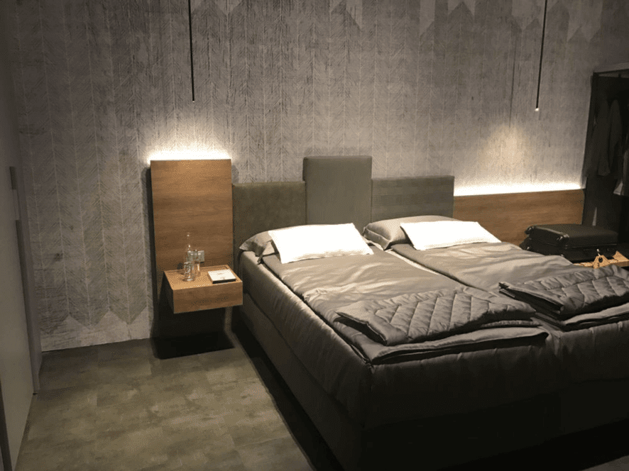 Ambient lights installed on the backside of the bedroom