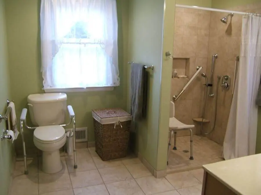 Bathroom with supports for disabled and elderly