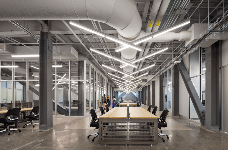 Exposed services in a workplace with function and asthetics