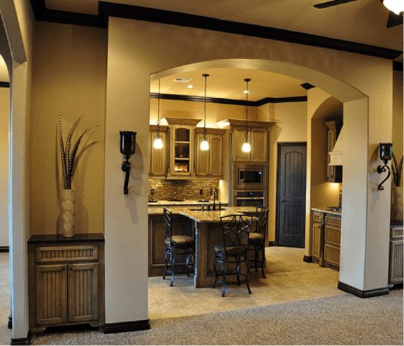 Shallow archway separating the kitchen from Living space