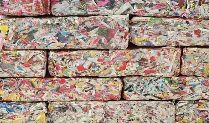 Bricks used in construction from recycled paper mesh and mud