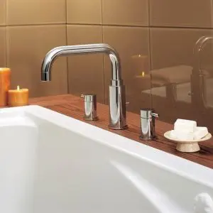 Deck or counter top mounted faucet used in bathrooms