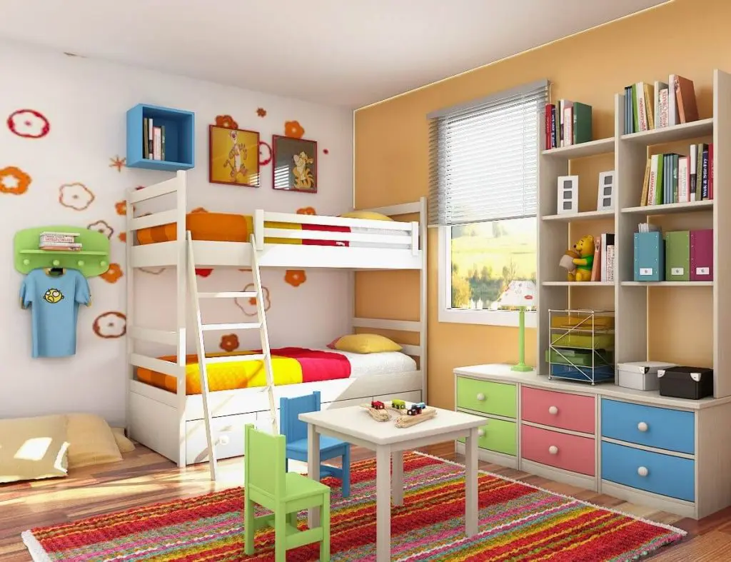 Wooden Laminate flooring with carpet and study table placed in the center of the room