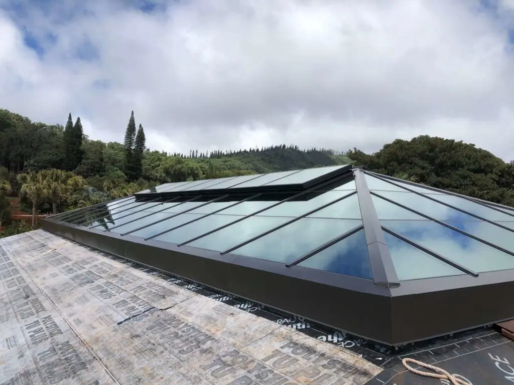 Hip Ridge skylight installed on the top of sloping roof