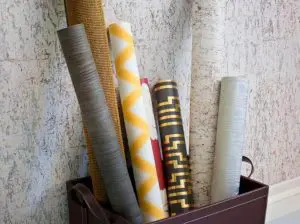 Different wallpapers placed in a basket