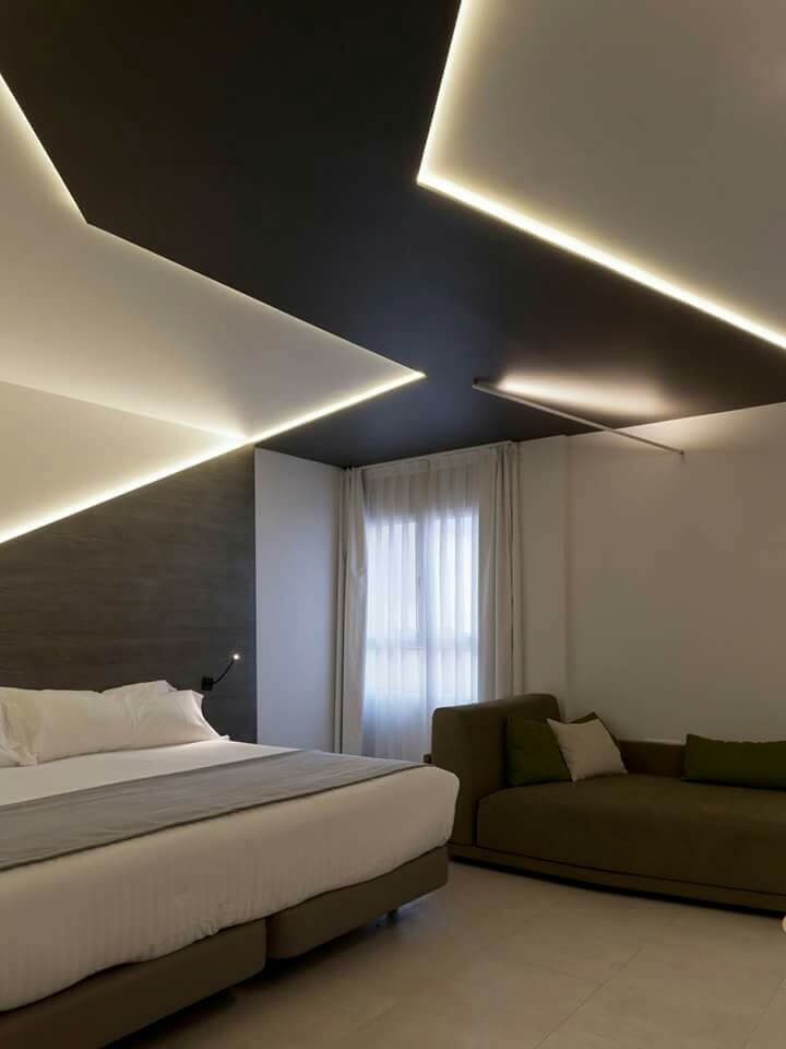 Cove lights installed in bedroom false ceiling
