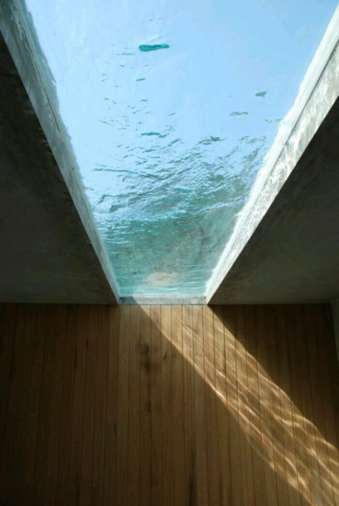 Natural Light through water placed on top of roof-1