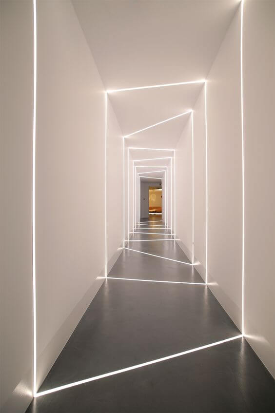 Strip lights installed from floor to ceiling in passage