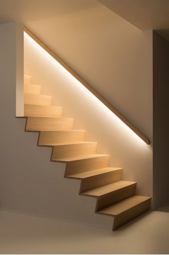 lights installed in handrail of a staircase