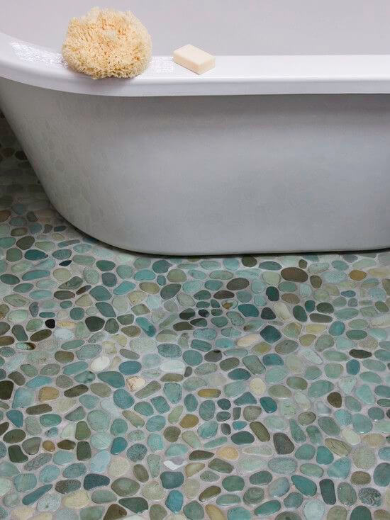 Unique bathroom flooring made in small stones of various colours