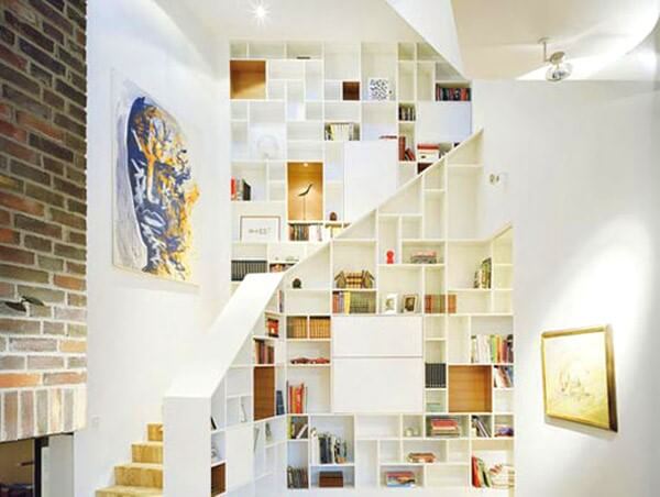 bookshelf designed below the handrail of staircase-1
