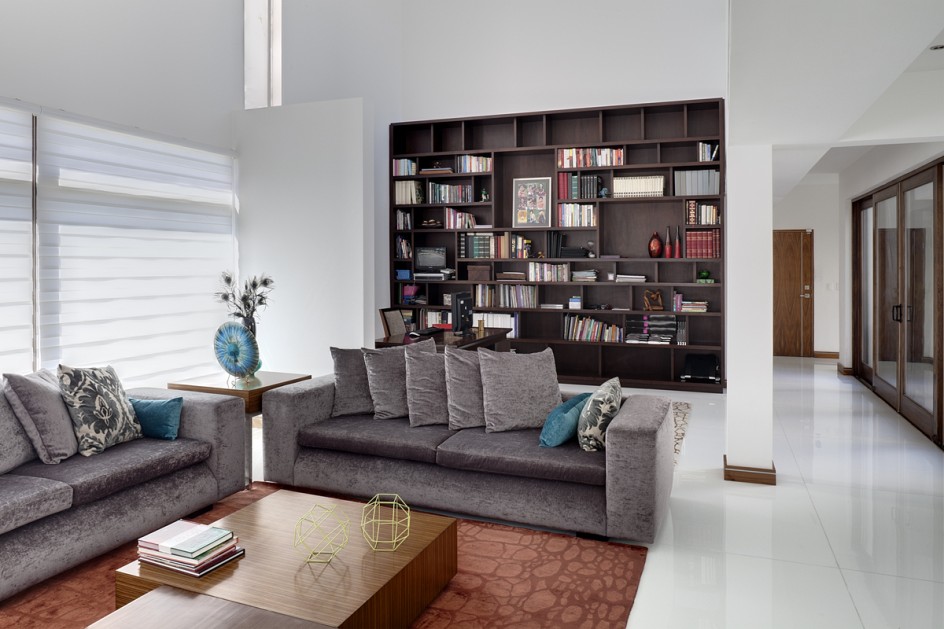 Living Room with Book shelves covering the entire walls