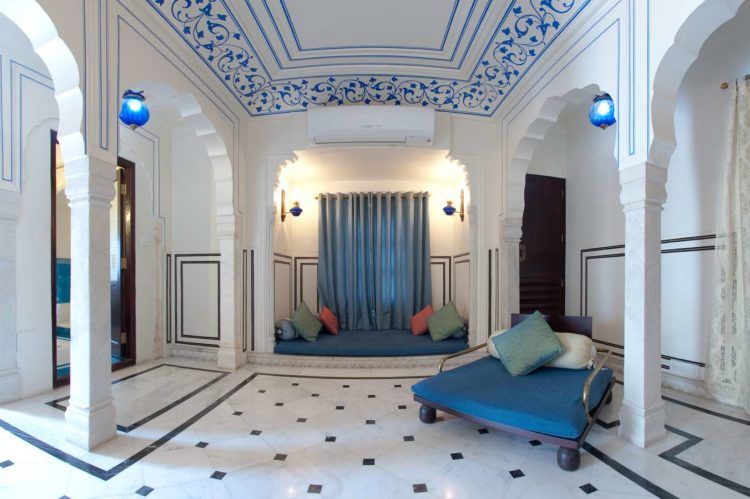 Haveli styled pillars flooring and painting for living room