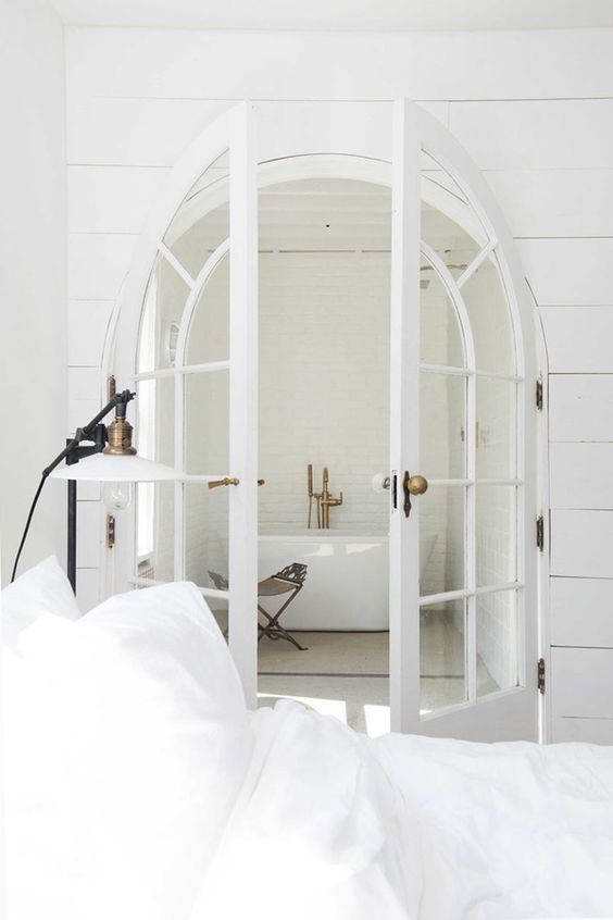 Bed and Bedroom door in complete white