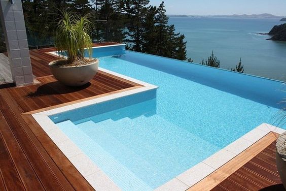 infinity pools - Pools that look like that extend into sky or sea