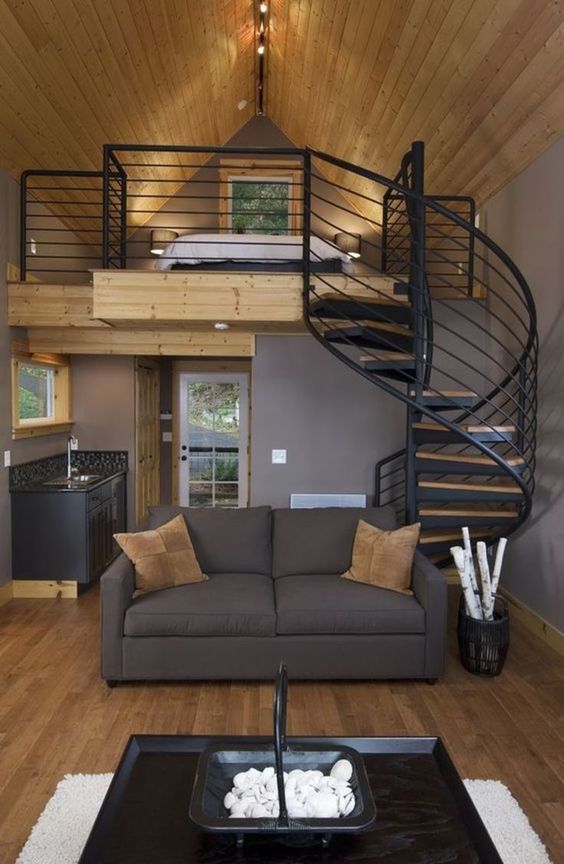 Loft in Living Room with a Bed on top