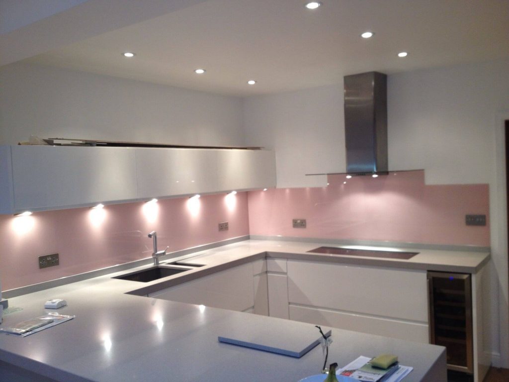 Kitchen Backsplash in Pastel pink color glass with lighting