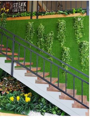 Vertical garden wall next to staircase