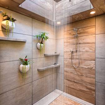 Potted plants installed in bathroom walls