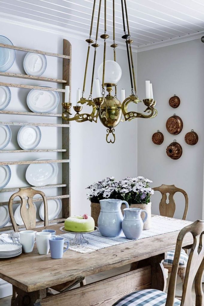 Decorating kitchen with plates, cooper vessels and hanging lights