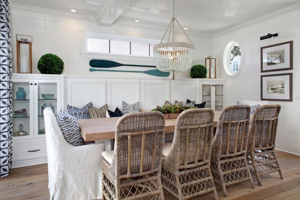 Jute chairs in dining area in a costal side house
