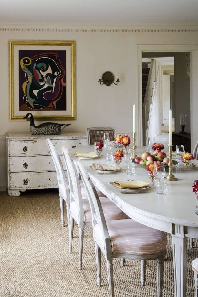 antique styled storage and chairs in Dining area