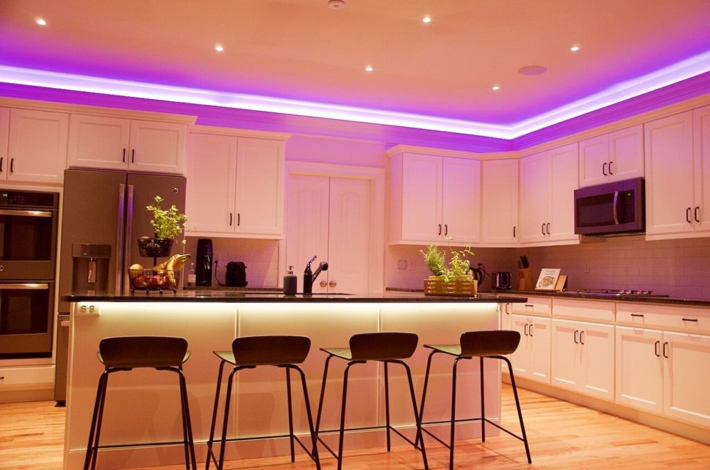 strip and cove lightings installed in kitchen and dining areas