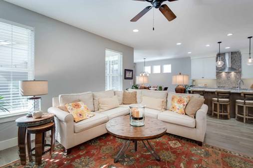 traditional patterned rug in a modern looking living room