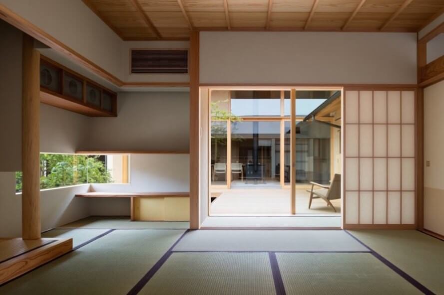 A sliding door from living room to the garden area in a japanese styled home