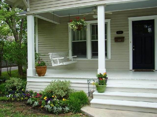 Decorating verandah deck with hammock and potted plants