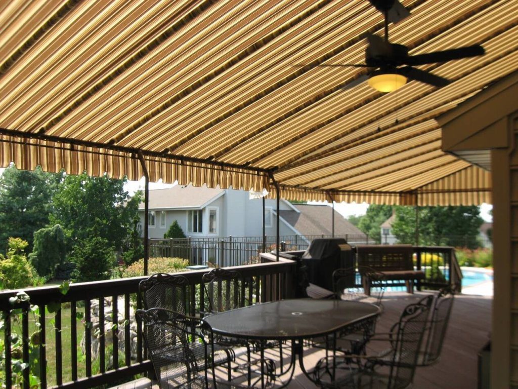 Verandah with a fabric share or awning on the top