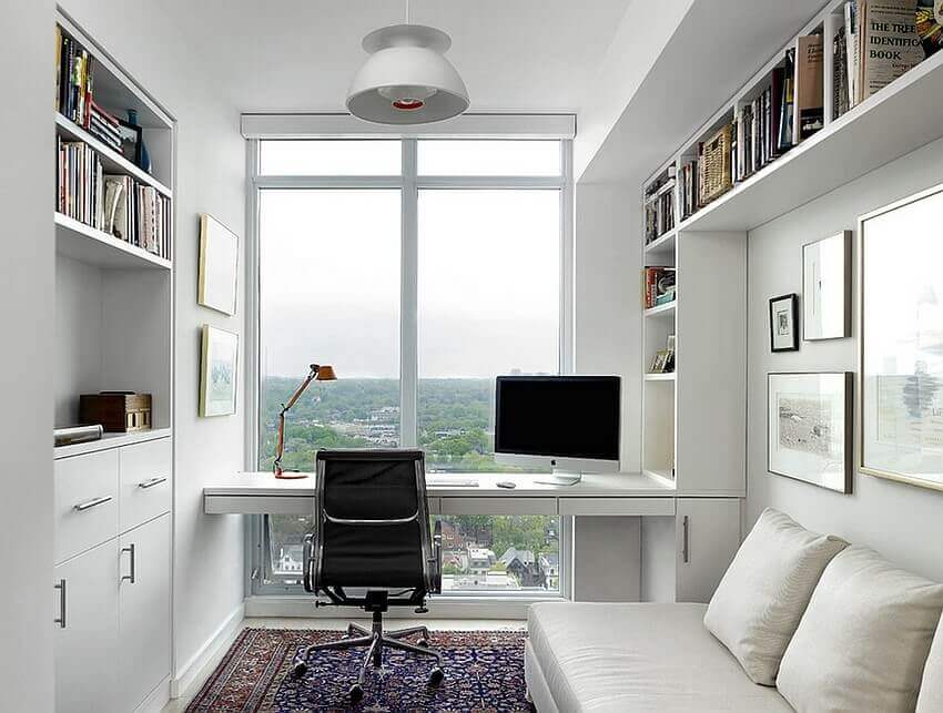 home office with storage, book shelves next to a open window