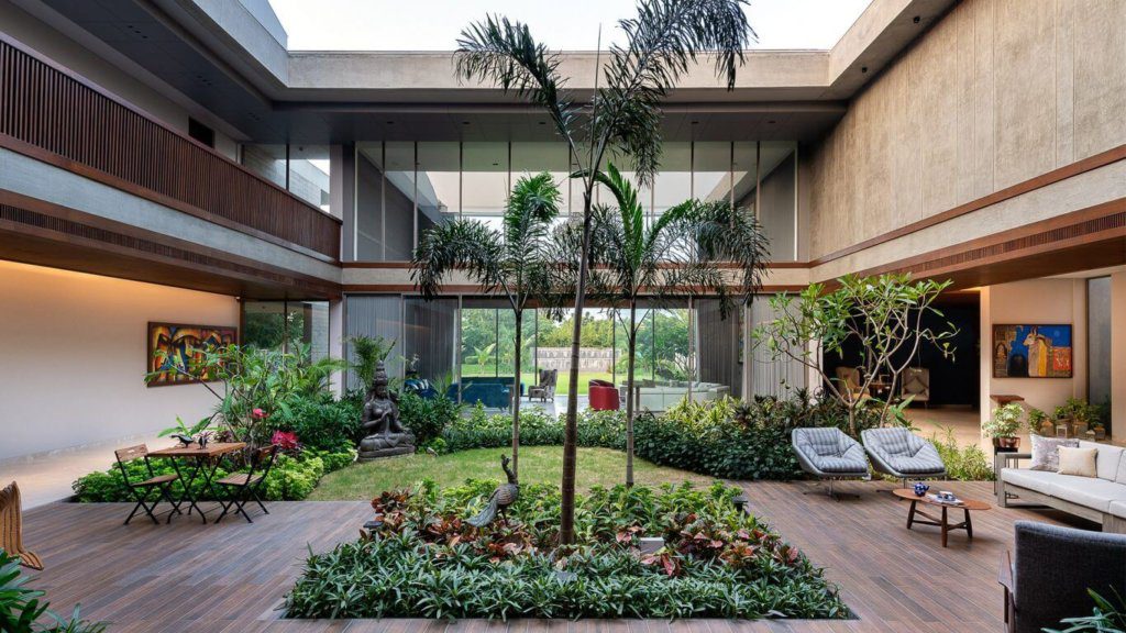 Courtyard in the center of building with garden and plants
