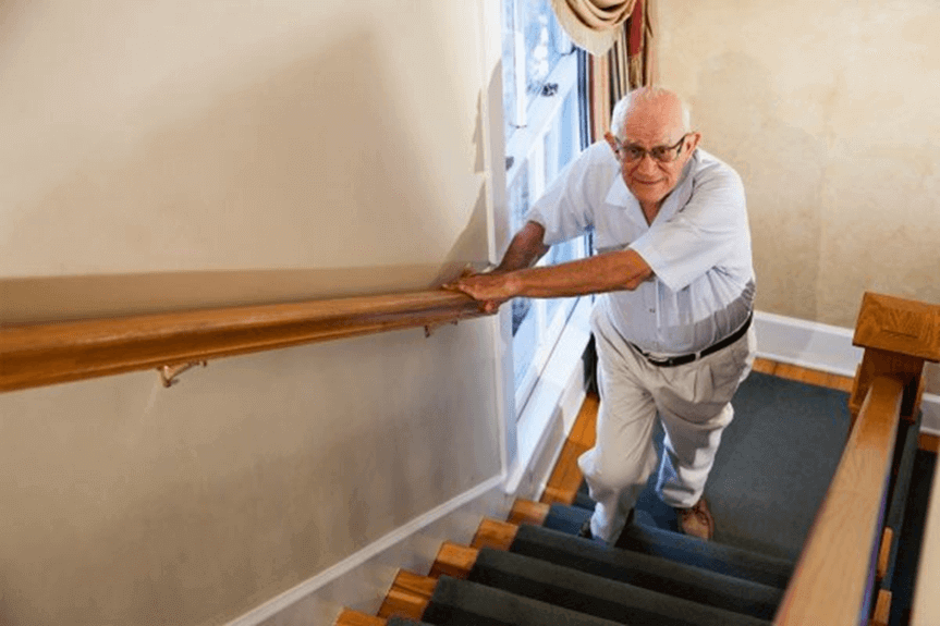 staircase with handrails on both sides for elderly access
