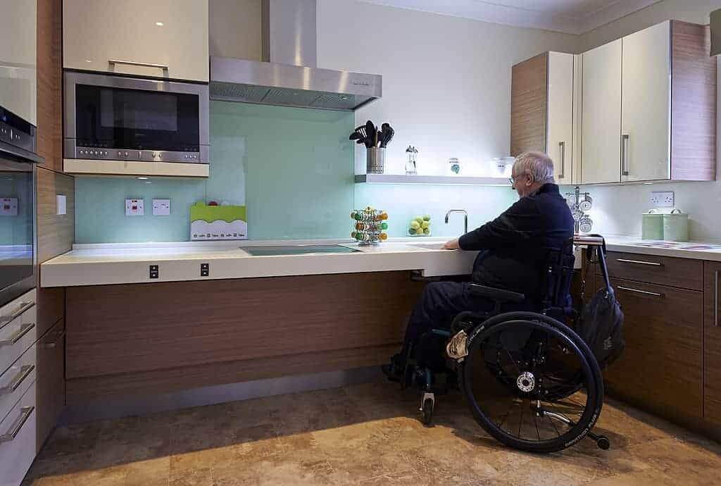 Adjustable counter tops for disabled persons