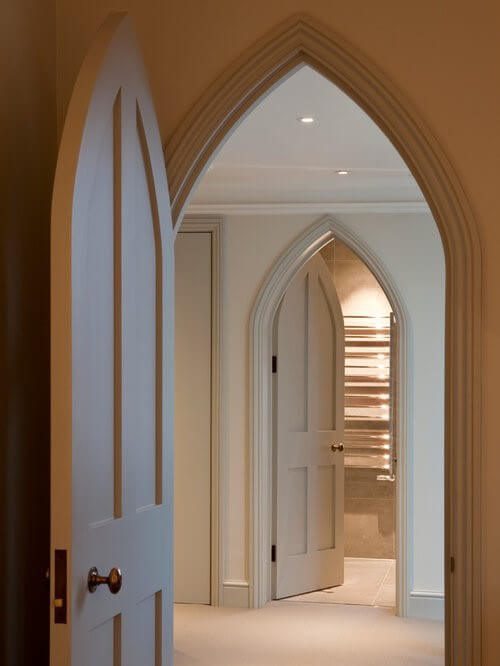 An archway with gothic arch inside a house