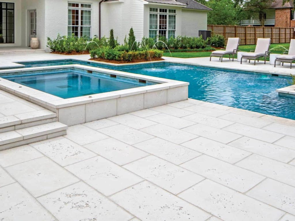 Concrete tiles around the pool as surface finish